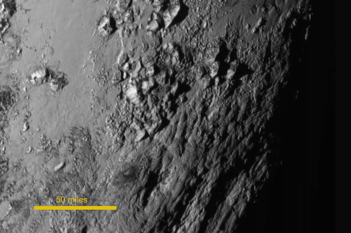 Image of Pluto’s surface, showing mountains thought to be made of water ice, from NASA’s New Horizons fly-by mission 