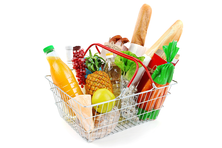 Metal shopping basket with groceries.