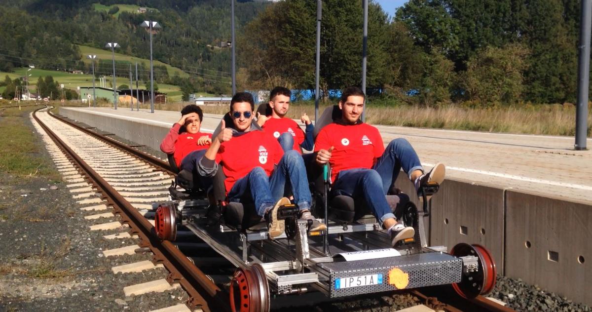 Roberto’s students take a trip on the rail rider.