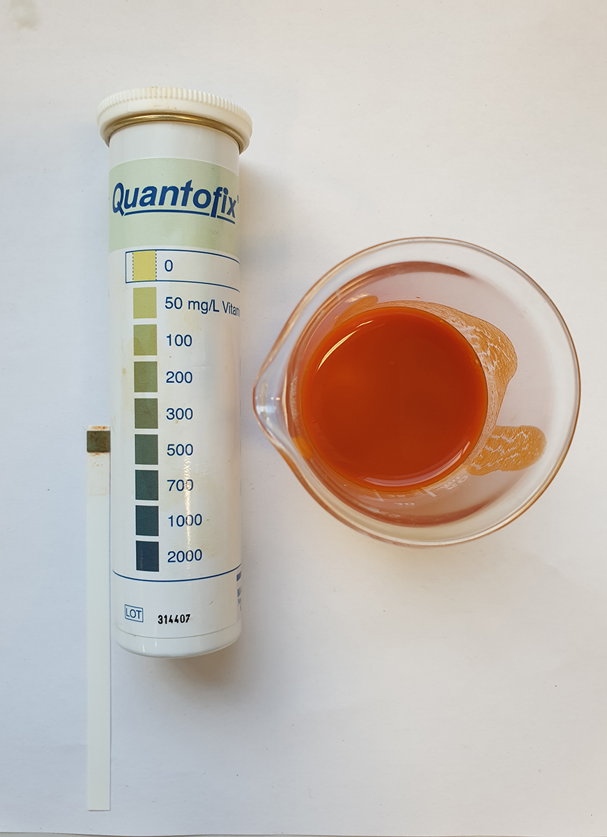 Vitamin C test strip and scale after immersion in goji berry juice