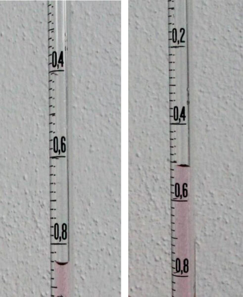 The water level in the graduated pipette at the beginning and end of the experiment, showing a volume increase