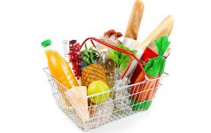 Metal shopping basket with groceries.