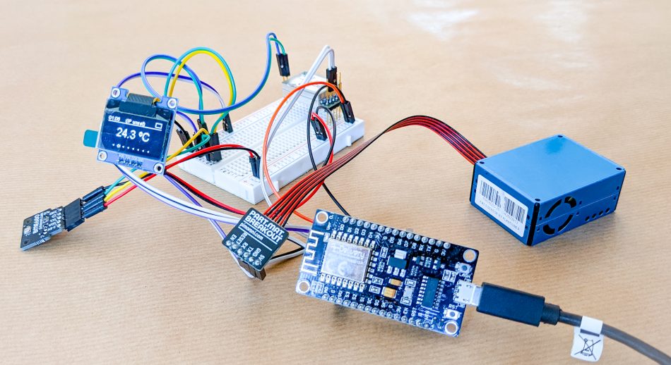 The different sensor components are connected to a circuit board via wire connections.