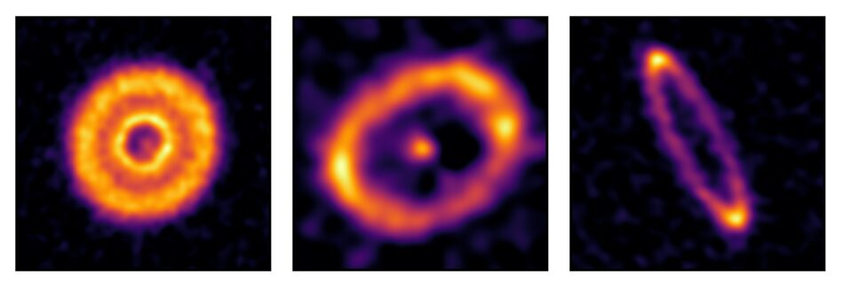 The rings are show as bright orange objects edged with purple against a black background. The first ring is donut-like: very thick with a small hole in the centre. The second ring is much thinner and looks more like an onion ring. The third is also very thin and imaged at an angle so that it appears as an elongated ellipse.
